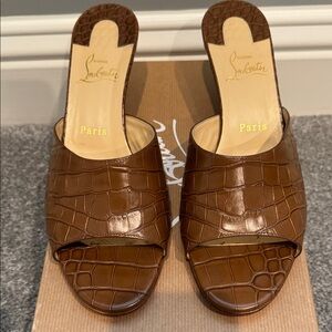 Christian Louboutin “East Mule” Croc-Embossed sandals